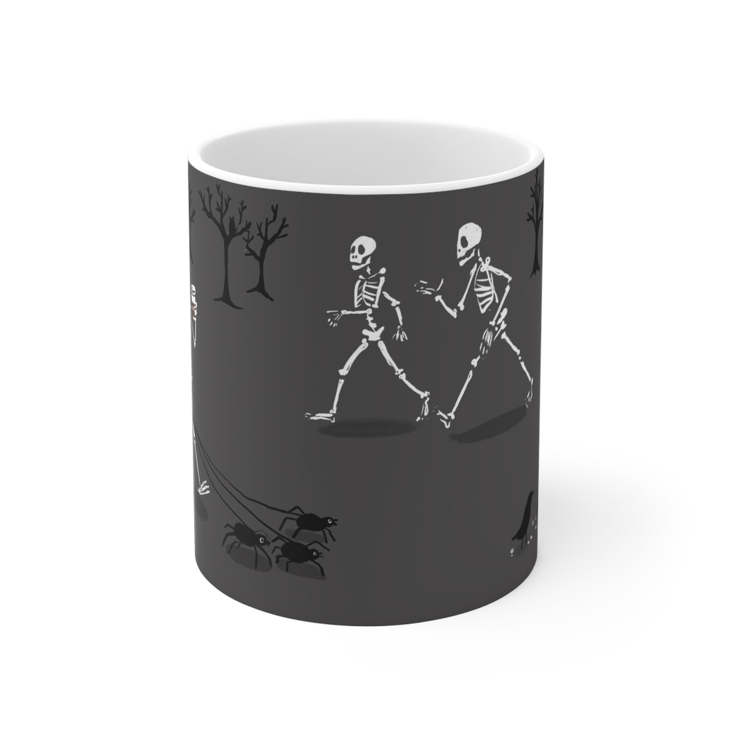Ceramic mug featuring skeletons walking through a park and feeding birds in a whimsical autumn illustration.