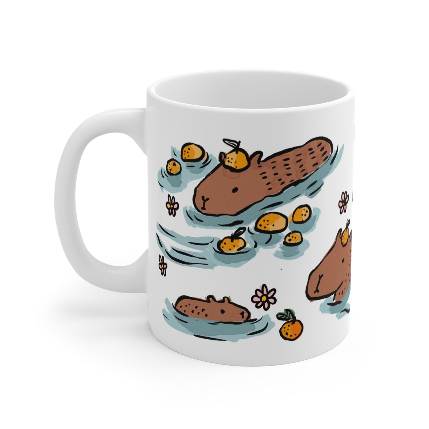 White ceramic mug featuring illustrated capybaras relaxing in a warm bath surrounded by floating oranges and flowers.
