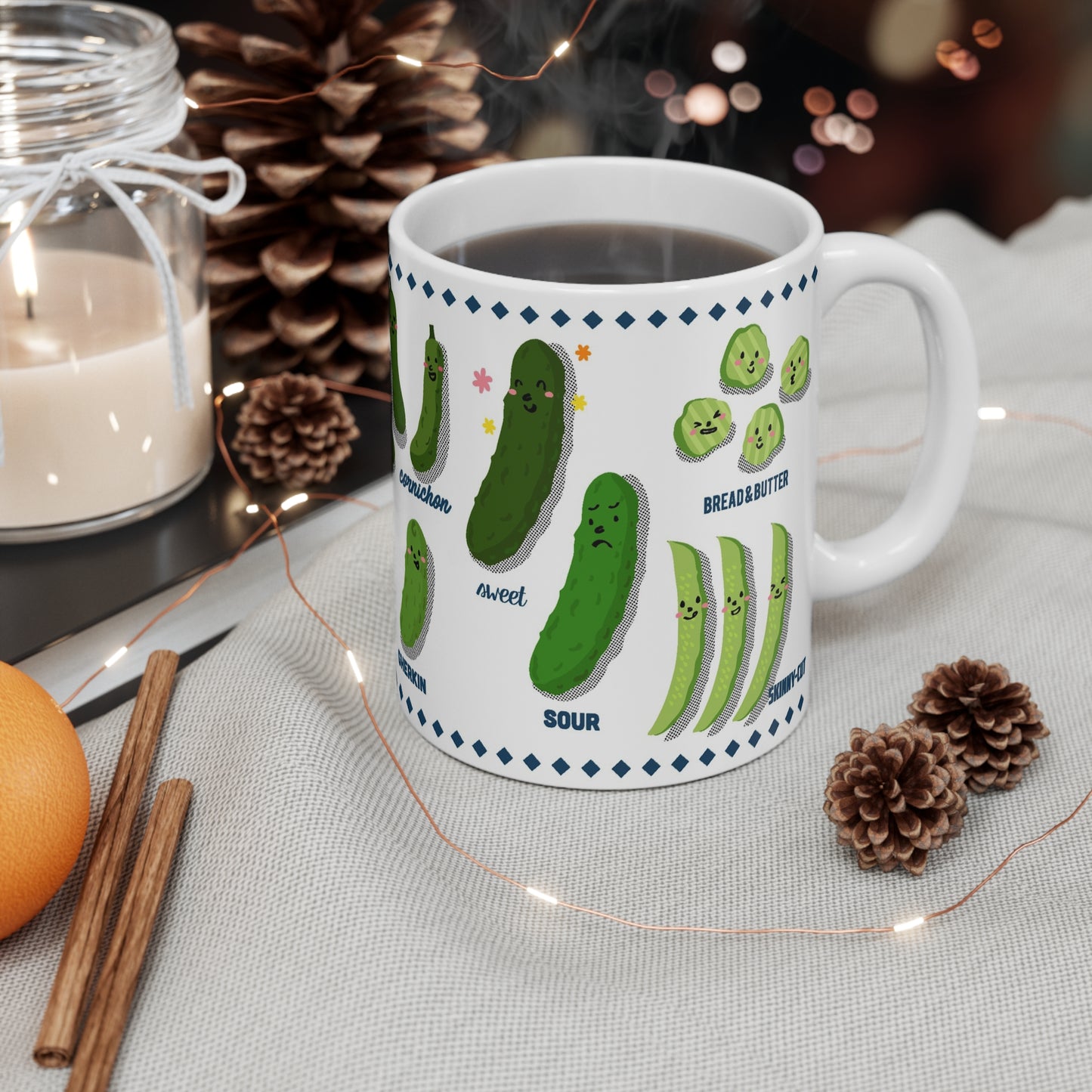 Ceramic mug with illustrated pickles showing sweet, sour, and bread-and-butter varieties, playful food art design