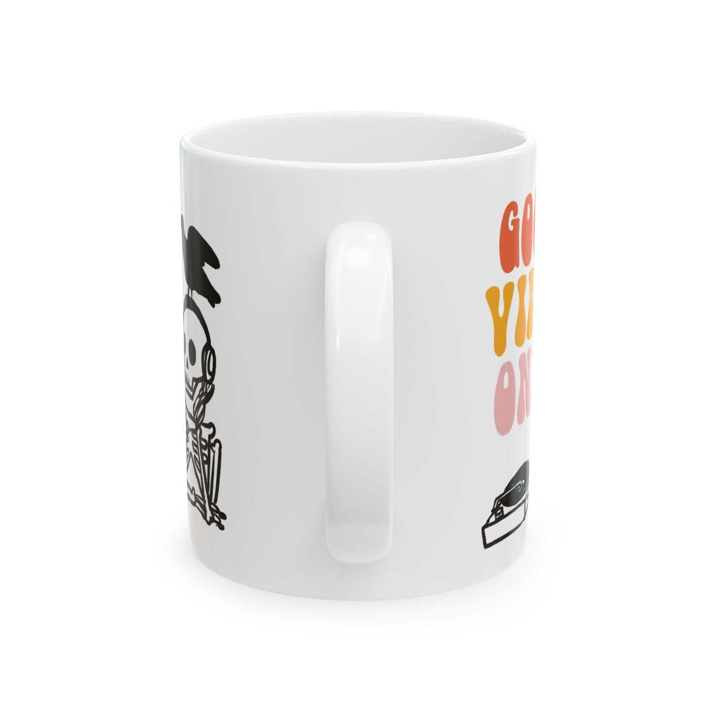 White ceramic mug featuring a skeleton DJ with headphones, a bird on its head, and retro text reading “Good Vibes Only.”