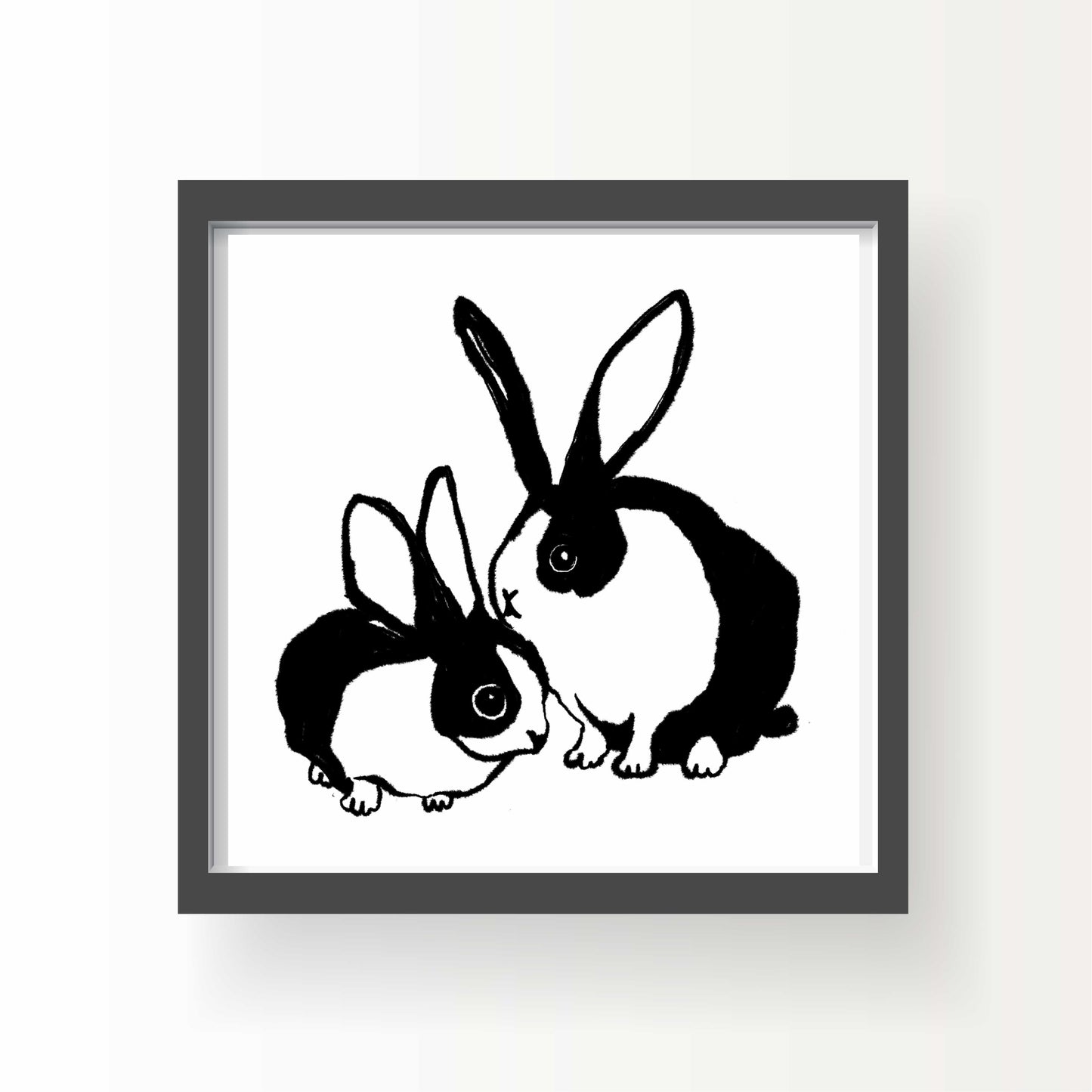 Black and white illustration of two Dutch rabbits in a tender, affectionate pose – minimalist 8x8 animal art print by Miss Johnny Squirrel