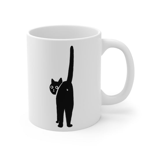 White ceramic mug with a minimalist black cat illustration facing backward with its tail raised.