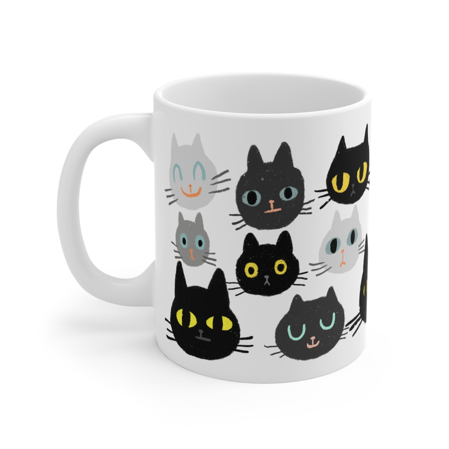 Ceramic mug featuring rows of illustrated cat faces in black, gray, and white tones with playful, wide-eyed expressions.