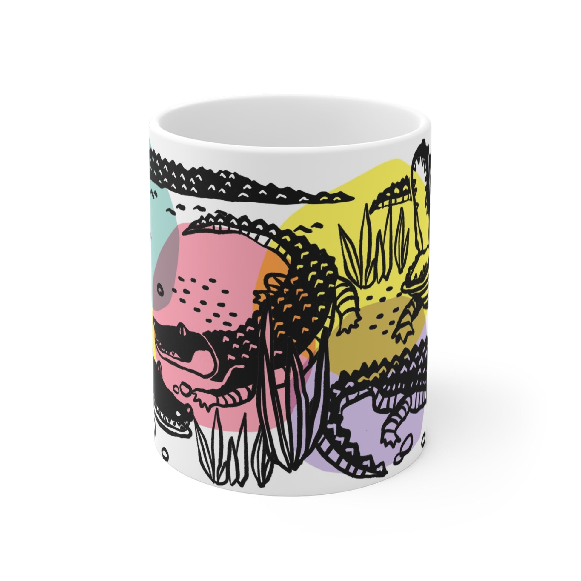Vibrant ceramic mug featuring whimsical alligator illustration with colorful retro-style swamp design.