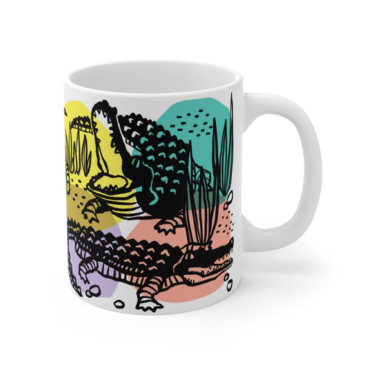 Vibrant ceramic mug featuring whimsical alligator illustration with colorful retro-style swamp design.