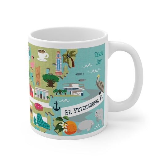 Colorful ceramic mug featuring illustrated St. Petersburg Florida landmarks and coastal design.