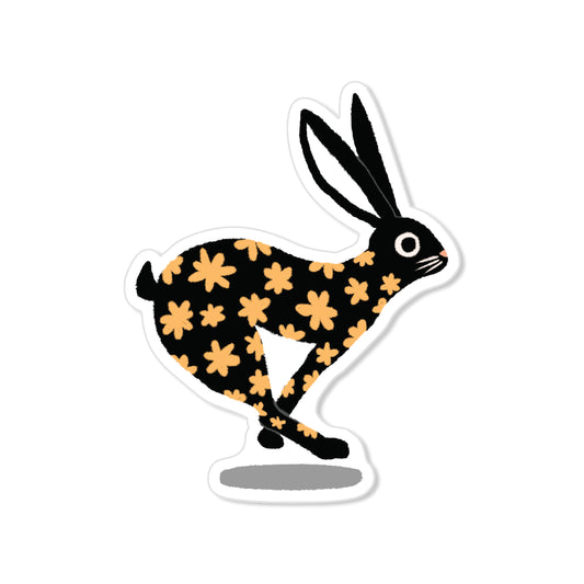 Hopping bunny sticker with black body and orange floral pattern, hand-drawn running rabbit illustration