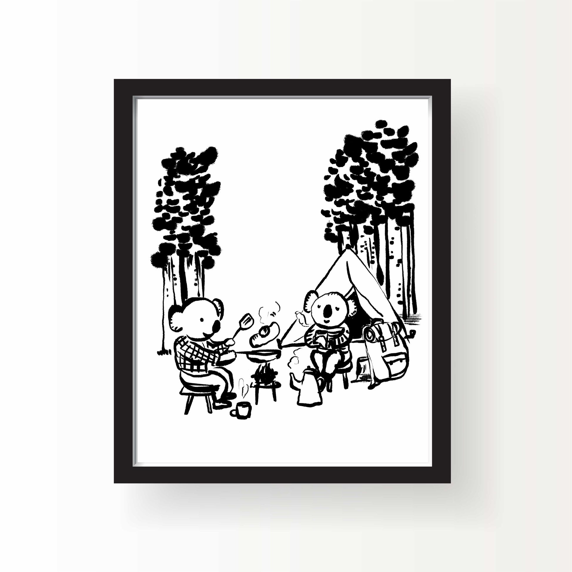 Black and white illustration of two koalas sitting at a campfire with a tent and pine trees behind them, roasting food and sipping from mugs in a forest setting.