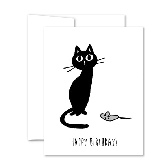 Illustration of a black cat with wide eyes sitting next to a small grey toy mouse, with “Happy Birthday” text.