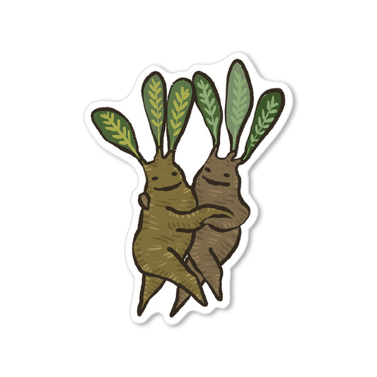 Sticker of two mandrakes dancing with leafy crowns, whimsical illustrated folklore art.