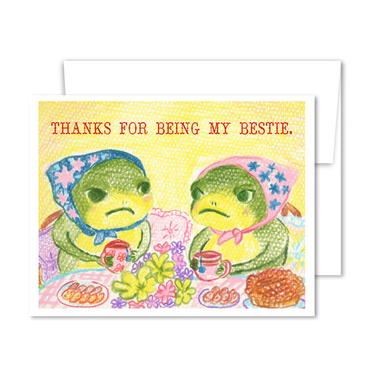 Illustrated two frogs in headscarves at a tea party with cookies and pie, “Thanks for Being My Bestie” friendship greeting card