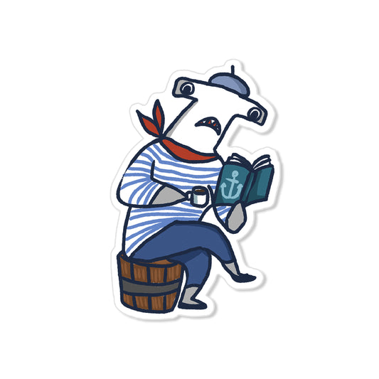 Hammerhead shark sailor sticker with striped shirt, beret, coffee, and book, hand-drawn nautical illustration