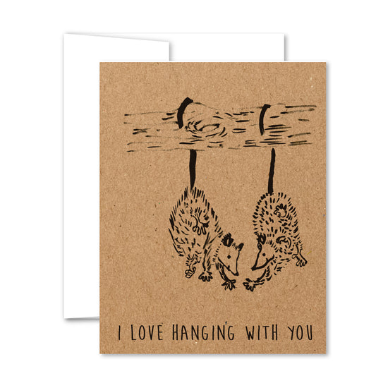 Possum love greeting card with two hanging possums illustration on kraft background.