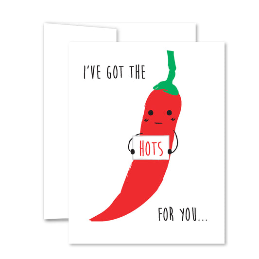 Greeting card with a smiling red chili pepper holding a sign reading “HOTS,” captioned “I’ve got the hots for you…” in playful illustration style.