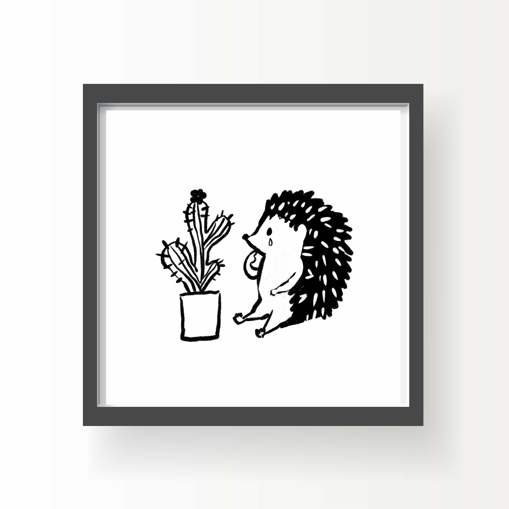 Black and white illustration of a hedgehog sitting in front of a potted cactus, looking emotional, with simple linework and expressive posture.