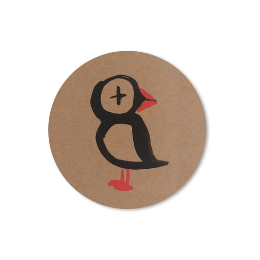 Puffin sticker with bold black outline, red beak, and feet, hand-drawn coastal bird illustration