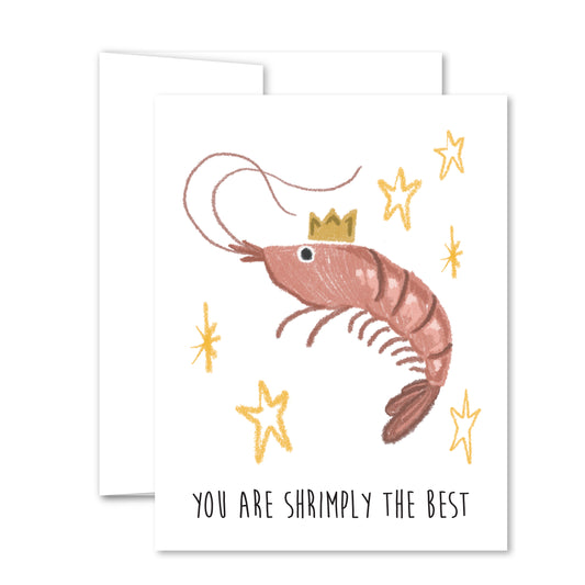Whimsical friendship card with a hand-drawn pink shrimp wearing a gold crown, stars, and the message “You Are Shrimply the Best.”