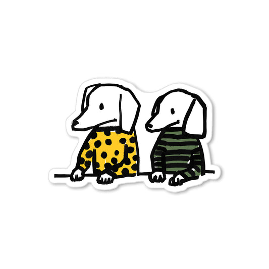 Two dogs sticker in yellow polka dot and green striped sweaters, hand-drawn illustration