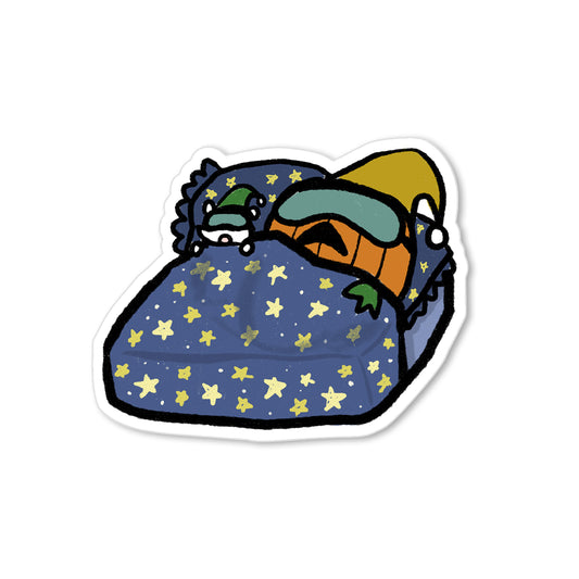Sticker of a pumpkin sleeping in a star-patterned bed with nightcap and frog plush, whimsical illustration.